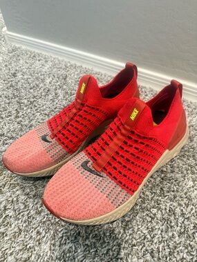 Nike Red Knit Slip-On Sneakers with Yellow Insole Accent